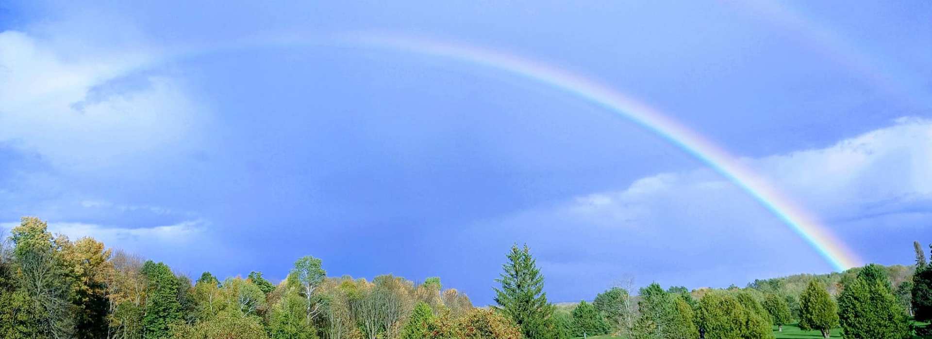 Rainbow over golf course